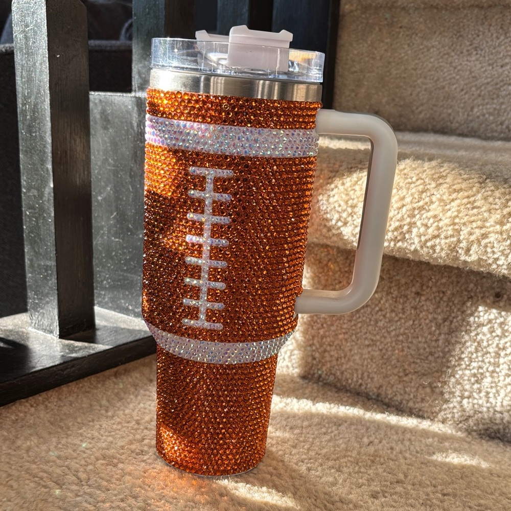 Orange football into Rhinestone Tumbler with Handle